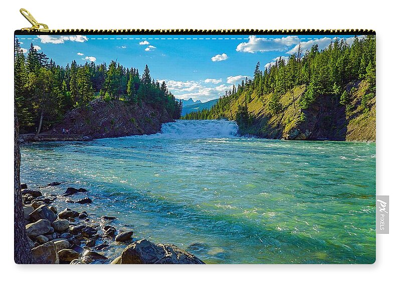 Mountain Zip Pouch featuring the photograph Bow River in Banff by Susan Rydberg
