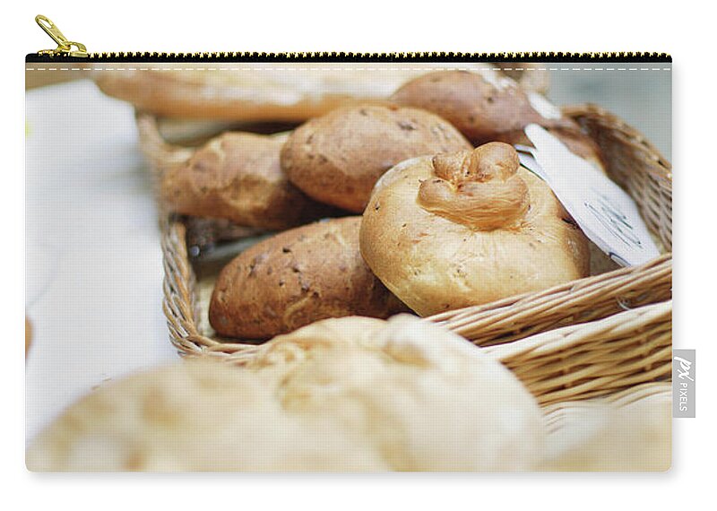 Bakery Carry-all Pouch featuring the photograph Breads For Sale On Table by Floresco Productions