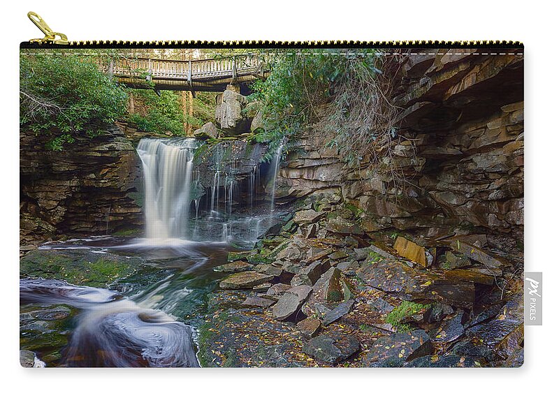 Wv Zip Pouch featuring the photograph Bridge Above the Falls by Amanda Jones