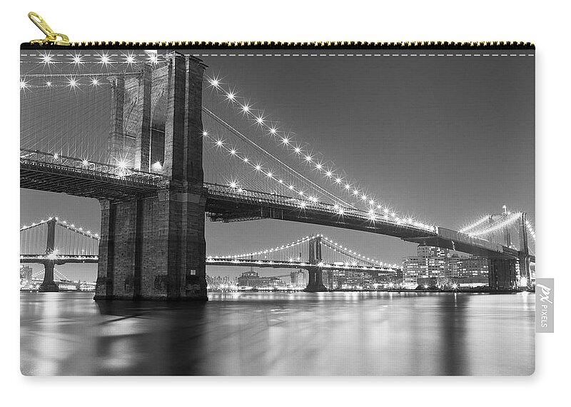Scenics Zip Pouch featuring the photograph Brooklyn Bridge At Night by Adam Garelick