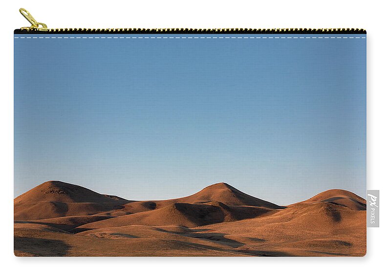 Brown Zip Pouch featuring the photograph Brown Mounds by Todd Klassy