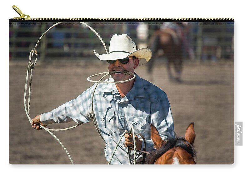 Rodeo Zip Pouch featuring the photograph Calf Roper by Mike Long