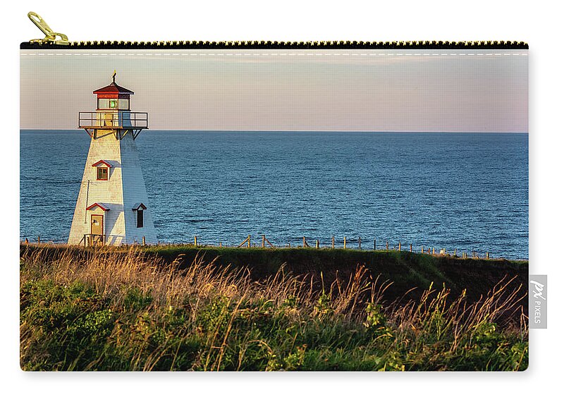 Pei Zip Pouch featuring the photograph Cape Tryon Lighthouse by Douglas Wielfaert