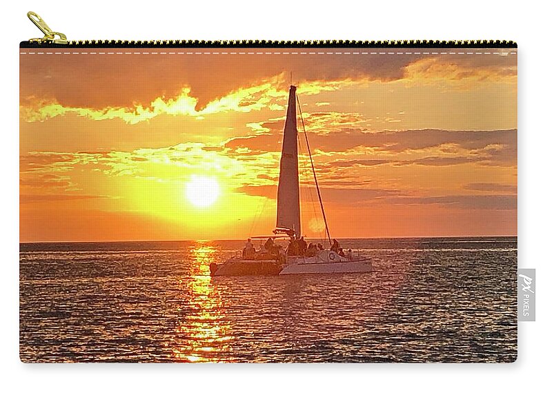 Beach Carry-all Pouch featuring the photograph Catamaran Sailing Past Sunset in Captiva Island Florida 2019 by Shelly Tschupp