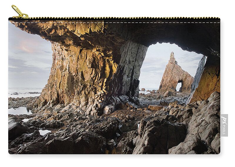 Tranquility Zip Pouch featuring the photograph Cave In Campiecho Beach by Ramón Espelt Photography