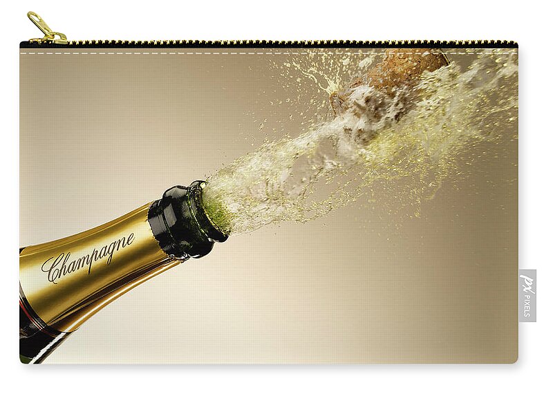 Celebration Zip Pouch featuring the photograph Champagne And Cork Exploding From Bottle by Andy Roberts