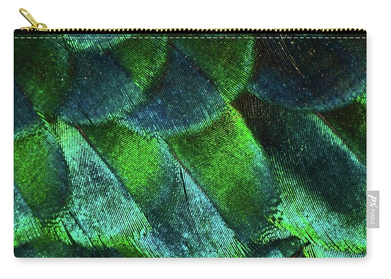 Natural Pattern Zip Pouch featuring the photograph Close Up Of Peacock Feathers by Madmàt