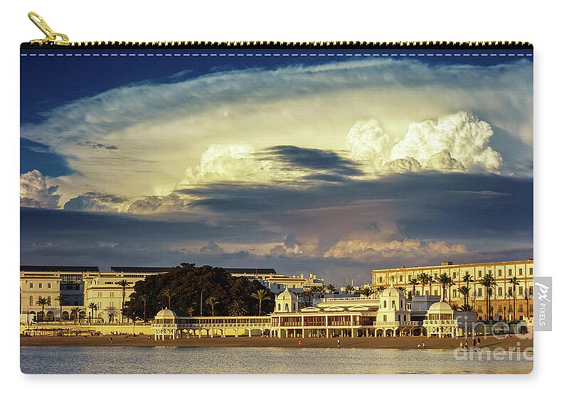 Famous Zip Pouch featuring the photograph Cloudy Sky over La Caleta Spa Cadiz by Pablo Avanzini