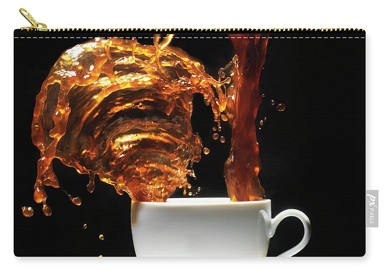 Black Background Zip Pouch featuring the photograph Coffee Being Poured Into Cup Splashing by Henrik Sorensen