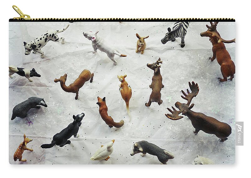 Badger Zip Pouch featuring the photograph Collection Of Small Toy Animals Viewed by Fiona Crawford Watson