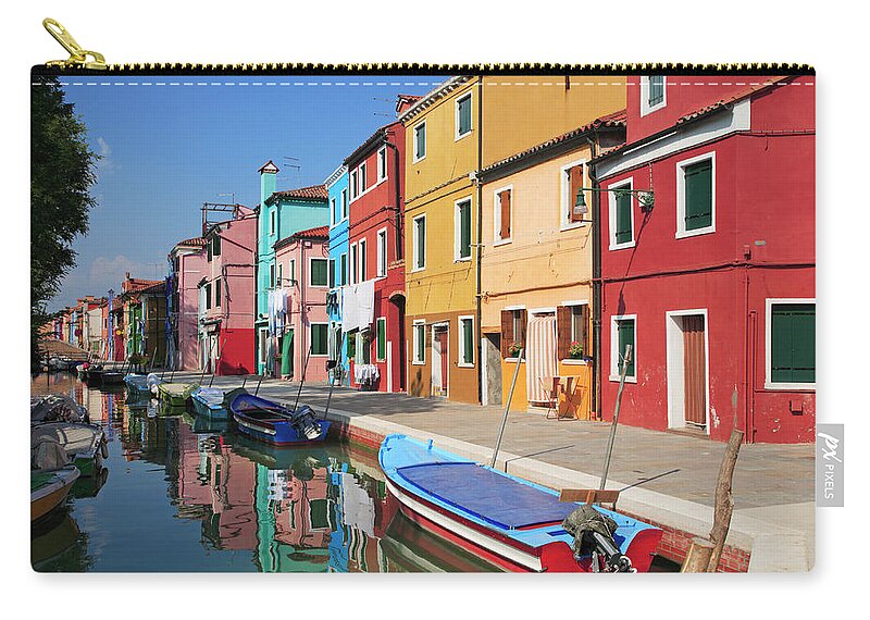 Row House Zip Pouch featuring the photograph Colored Houses On The Island Of Burano by Guy Vanderelst