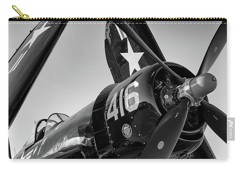 F4u Zip Pouch featuring the photograph Corsair under the setting sun by Chris Buff