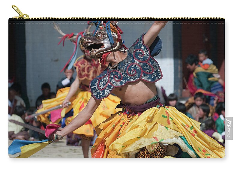 Stage Costume Zip Pouch featuring the photograph Costumed Dancer In Traditional Bhutan by Leezsnow
