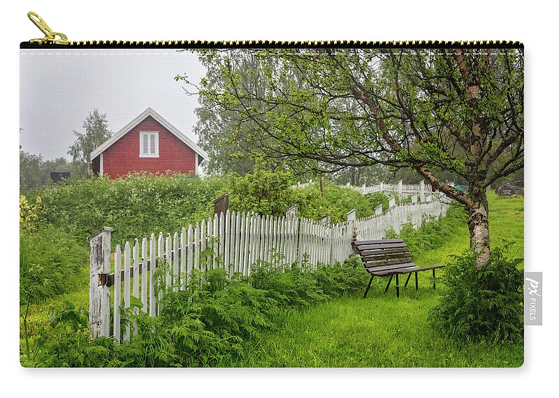 Fence Zip Pouch featuring the photograph Cottage in the Rain by Debra and Dave Vanderlaan