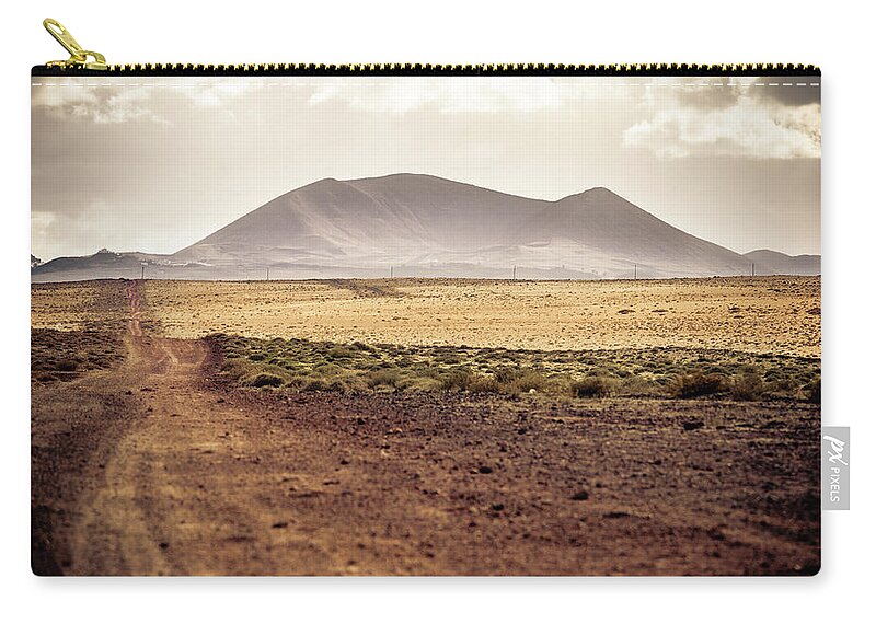 Scenics Zip Pouch featuring the photograph Country Road In Volcanic Landscape by Zodebala