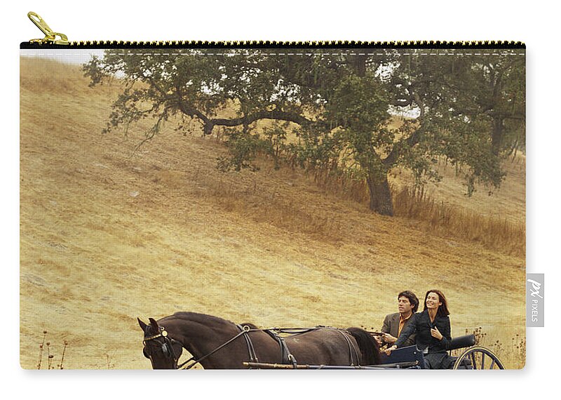 Horse Zip Pouch featuring the photograph Couple Riding In Horse-drawn Carriage by Lisa Romerein