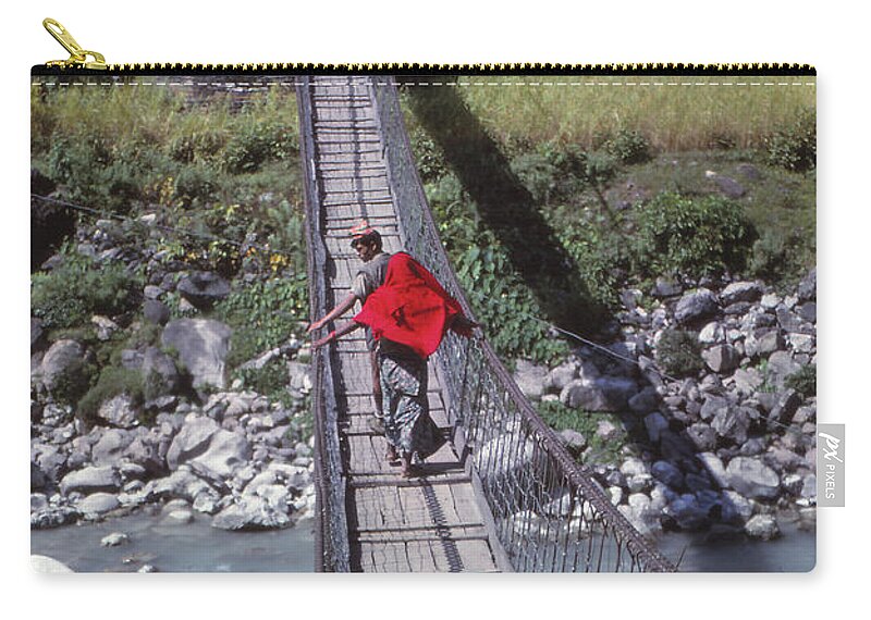 Nepal Zip Pouch featuring the photograph Crossing a suspension bridge by Steve Estvanik