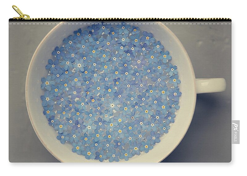 Netherlands Zip Pouch featuring the photograph Cup Of Forget Me Not by Paula Daniëlse
