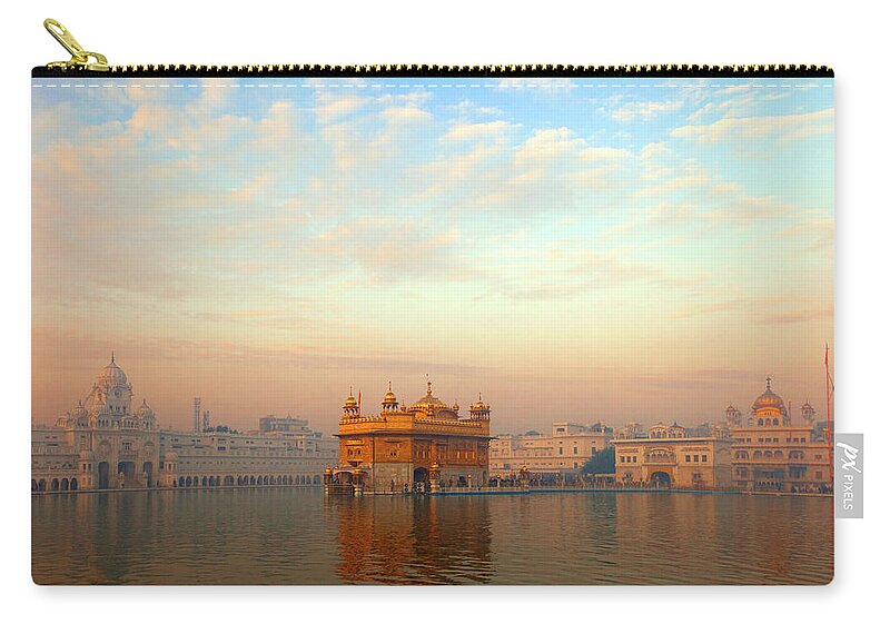 Dawn Zip Pouch featuring the photograph Dawn At The Golden Temple, Amritsar by Adrian Pope