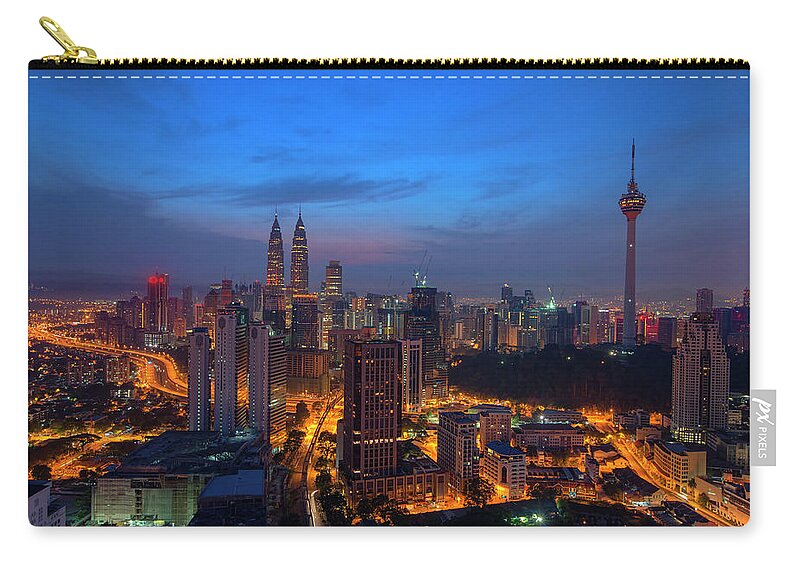 Dawn Zip Pouch featuring the photograph Dawn Of A New Day In Kuala Lumpur by Copyright © 2013 Nur Ismail Photography.all Rights Reserved