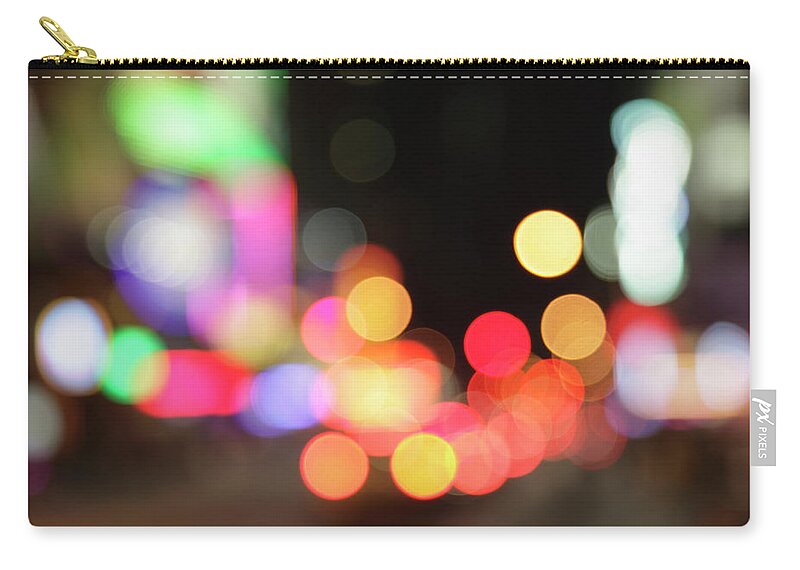 Funky Zip Pouch featuring the photograph Defocused Light Dots At Times Square In by Sebastian-julian