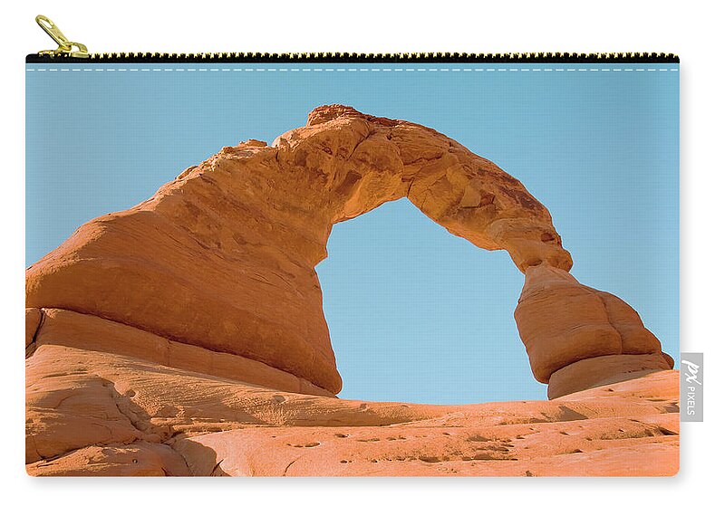 Tranquility Zip Pouch featuring the photograph Delicate Arch by Tom Kelly Photo