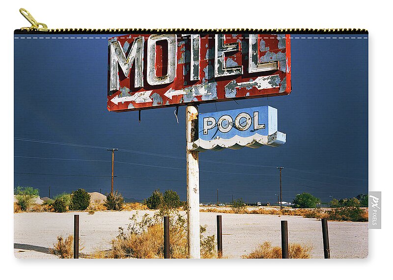 Tranquility Zip Pouch featuring the photograph Derelict Motel Sign In The Desert by Gary Yeowell