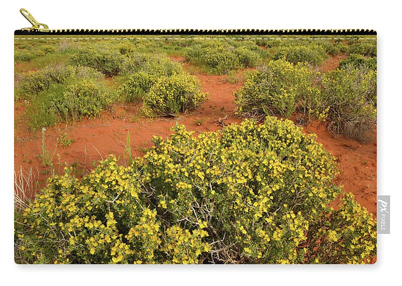 Moab Zip Pouch featuring the photograph Desert Blooming in Castle Valley Utah by Ray Mathis
