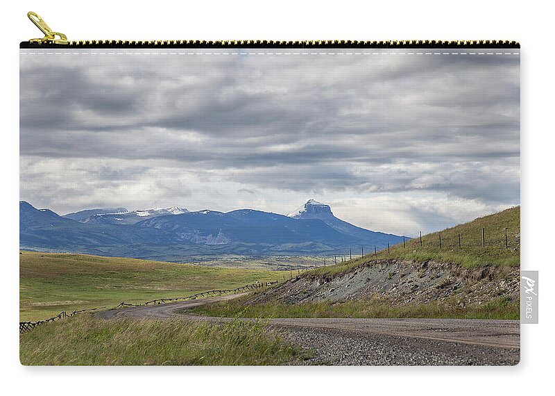 Rockies Zip Pouch featuring the photograph Distant Mountains In Color 2014 by Thomas Young