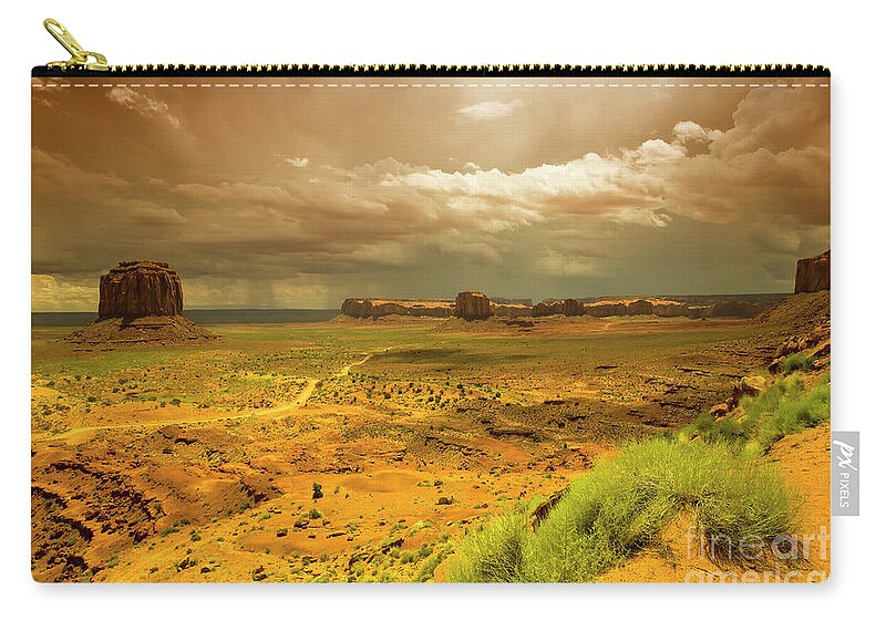 Distant Rain Zip Pouch featuring the photograph Distant Rain, Monument Valley by Felix Lai