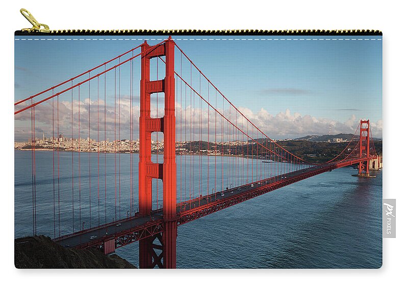 San Francisco Zip Pouch featuring the photograph Dramatic Lighting Of The Golden Gate by Stephanhoerold