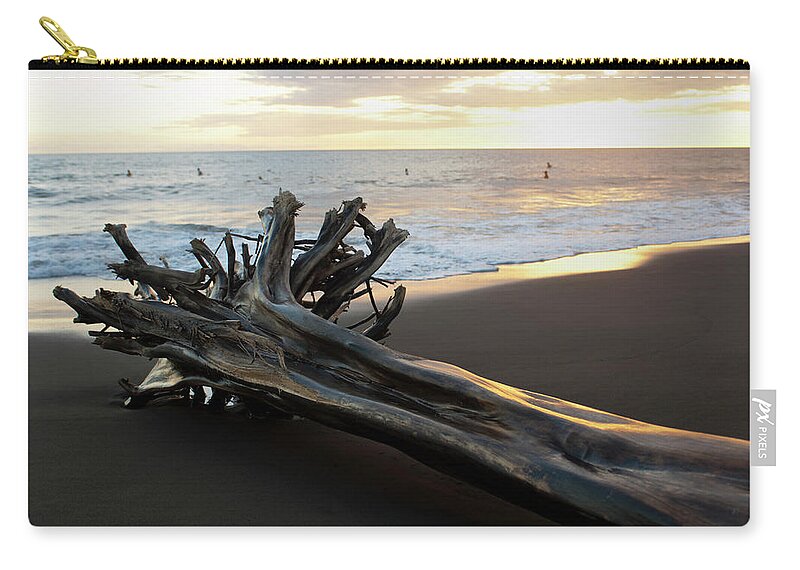 Water's Edge Zip Pouch featuring the photograph Driftwood And Surfers On Playa Hermosa by Driendl Group