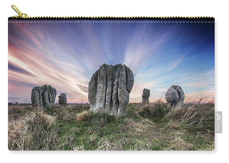 Prehistoric Era Zip Pouch featuring the photograph Duddo Stone Circle by Photography By Trevor Weddell