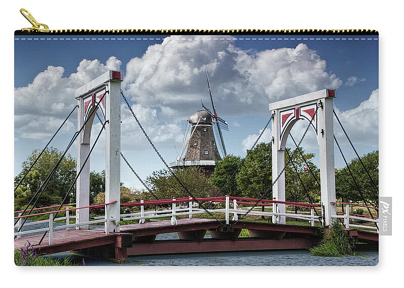 Windmill Zip Pouch featuring the photograph Dutch Bridge and the deZwaan Windmill at Windmill Island in Holl by Randall Nyhof