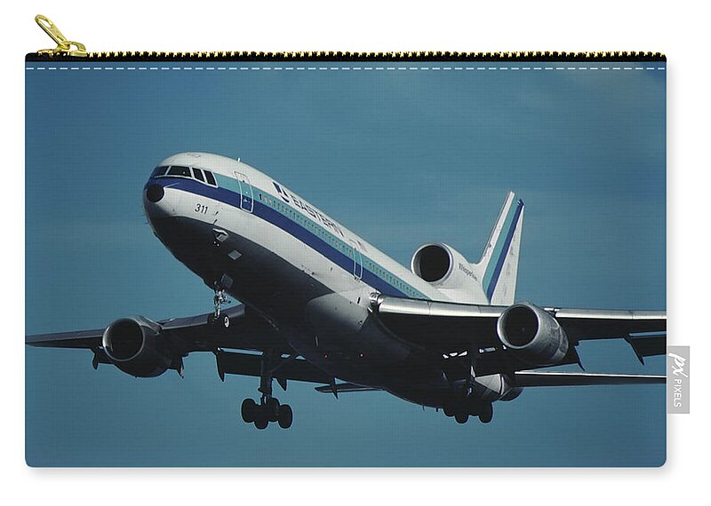 Eastern Airlines Zip Pouch featuring the photograph Eastern L-1011 TriStar Whisperliner by Erik Simonsen