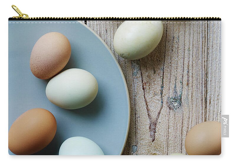 Easter Zip Pouch featuring the photograph Eggs by Dan Goldberg