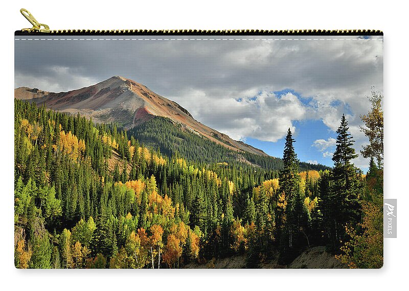 Colorado Zip Pouch featuring the photograph Fall Color Aspens Beneath Red Mountain by Ray Mathis