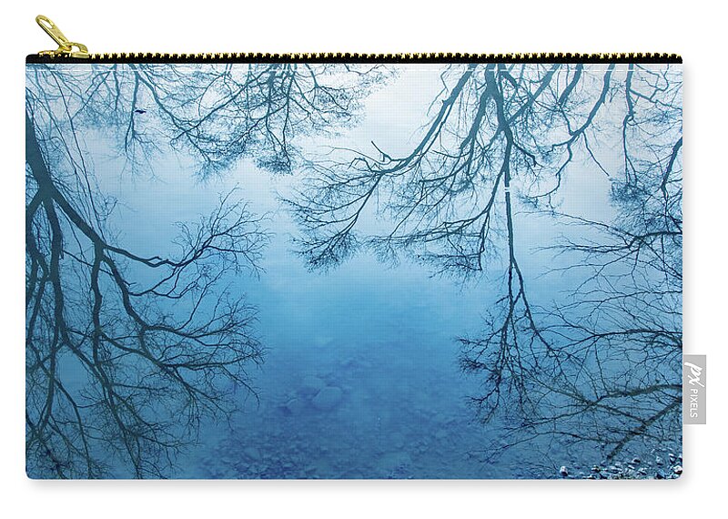 Foggy Zip Pouch featuring the photograph Feathery Foggy Reflections in Blue by Marcy Wielfaert
