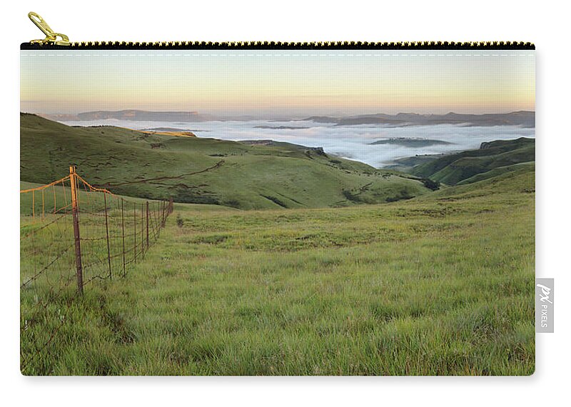 Dawn Zip Pouch featuring the photograph Fence Line Receding Into A Valley In by Emil Von Maltitz