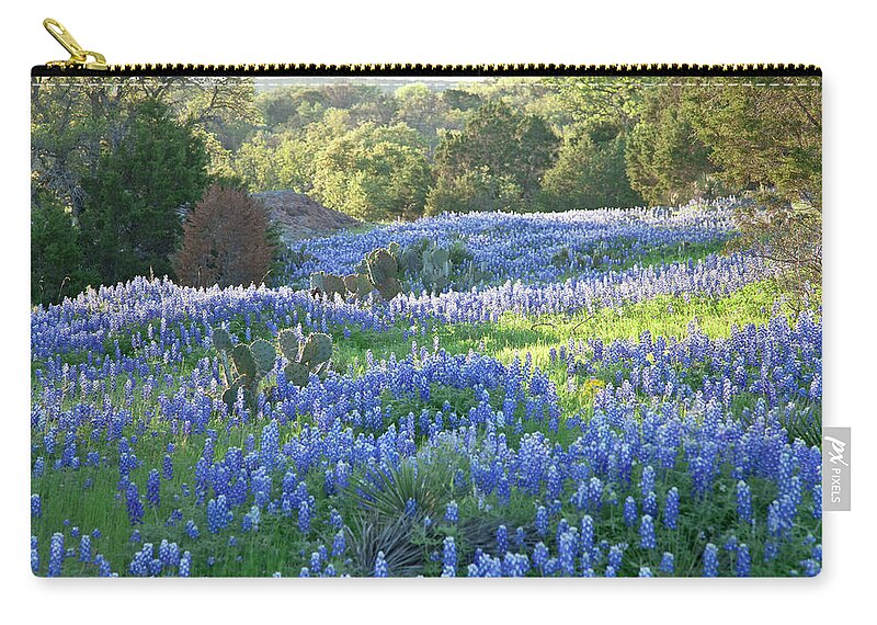 Bluebonnet Zip Pouch featuring the photograph Field Of Texas Bluebonnets Skimmed By by Dhughes9