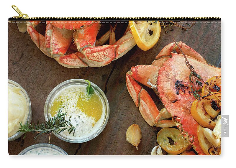 Roast Dinner Carry-all Pouch featuring the photograph Fire Roasted Dungeness Crabs On Wooden by Lisa Romerein