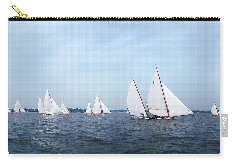 Recreational Pursuit Zip Pouch featuring the photograph Fleet Of Sailing Log Canoes Racing by Greg Pease