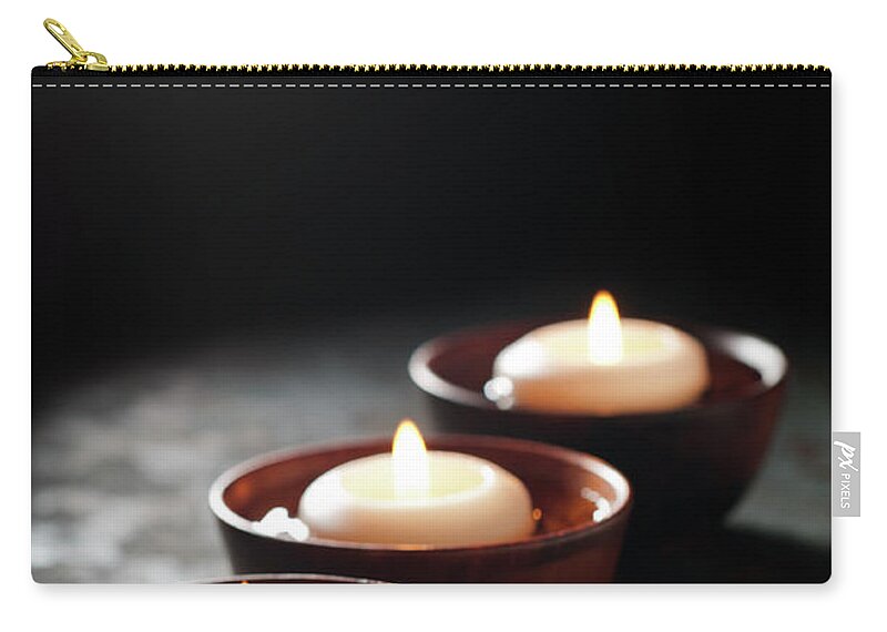 Floating Candle Zip Pouch featuring the photograph Floating Candles In A Zen Background by Nightanddayimages