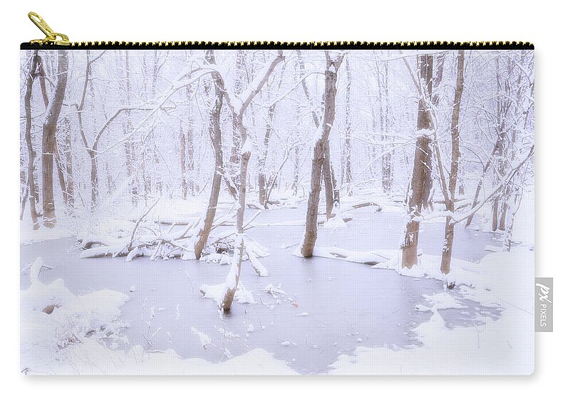 Trees Zip Pouch featuring the photograph Flooded trees in the snow by Karen Smale