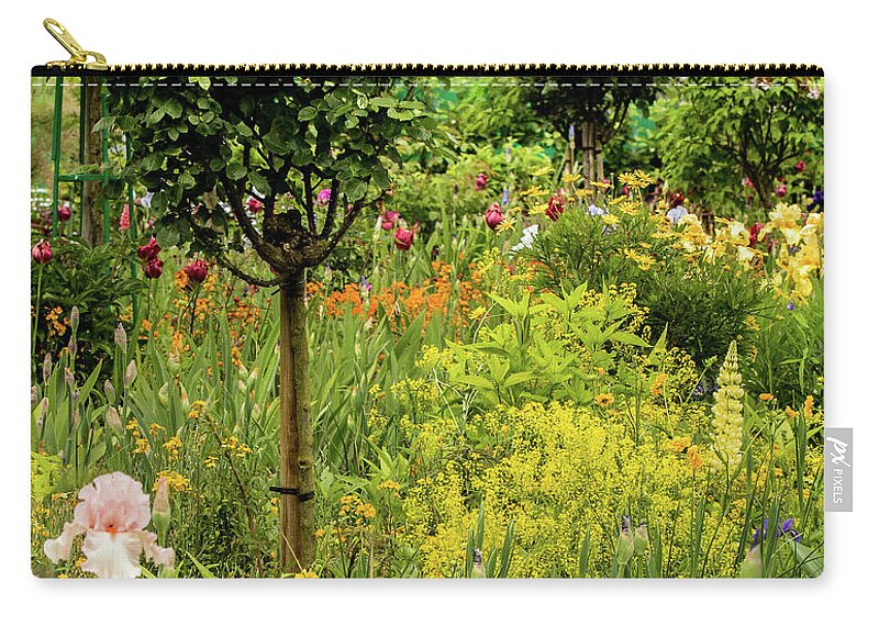 Gardens Of Claude Monet Zip Pouch featuring the photograph Florals in Yellow by E Faithe Lester