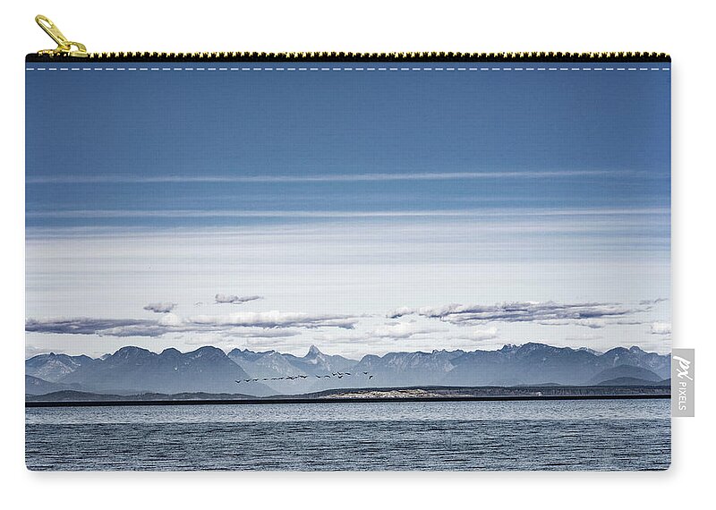 Flying Carry-all Pouch featuring the photograph Flying by the Beach by Kathy Paynter