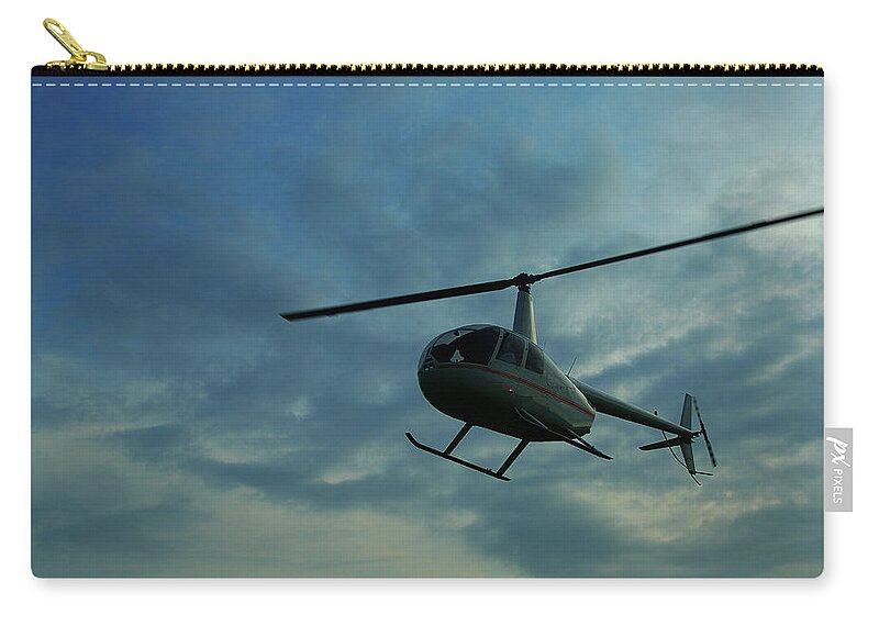 Mid-air Zip Pouch featuring the photograph Flying Helicopter by Copyright Bong Manayon