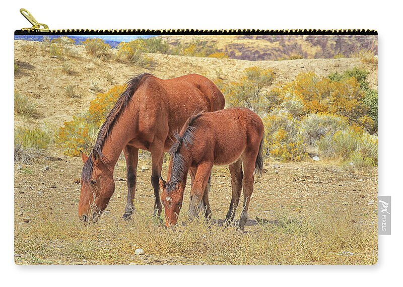 Nevada Zip Pouch featuring the photograph Following the Lead by Tom Kelly