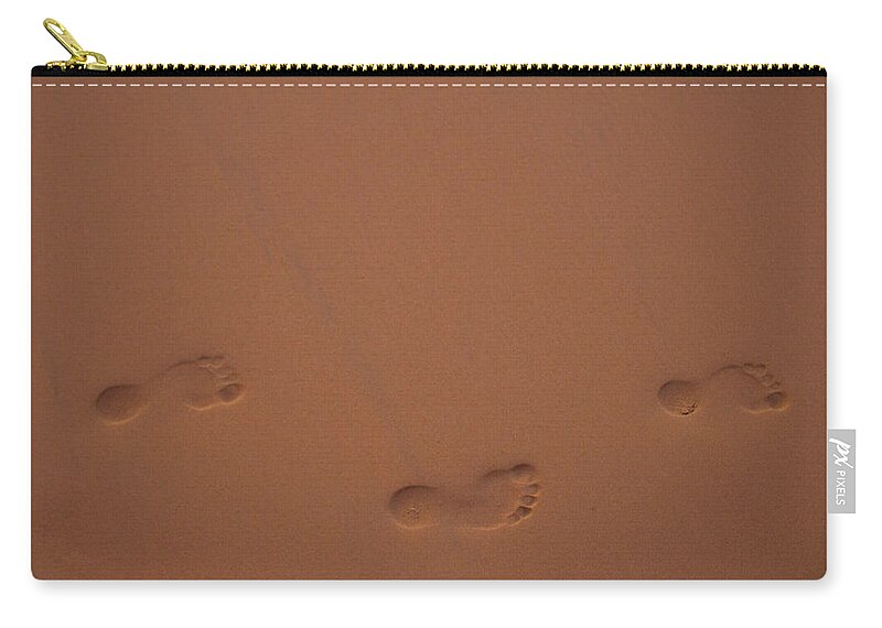 Barbados Zip Pouch featuring the photograph Foot prints in sand by Stuart Manning