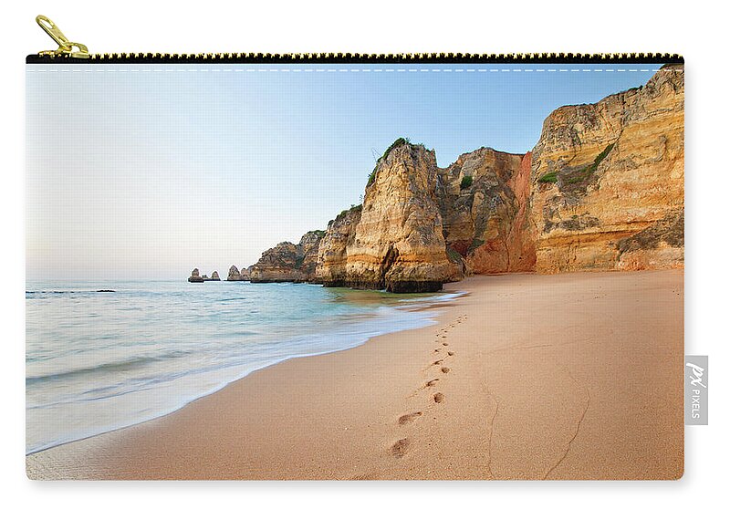 Water's Edge Zip Pouch featuring the photograph Footsteps In Sand by M Swiet Productions